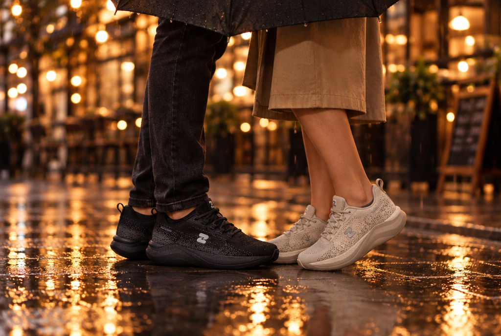 A couple in black and sand Oszea sneakers on a rainy evening date